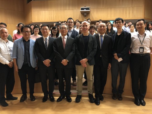 Prof. Robert Brown, part-time lecturer of our school, took a group photo with the guests